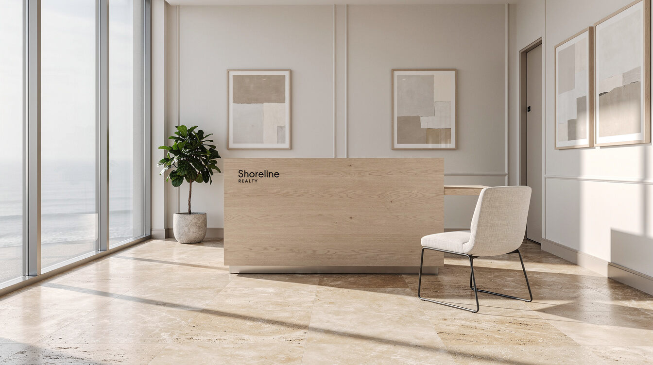 Boutique agency reception desk with ocean light